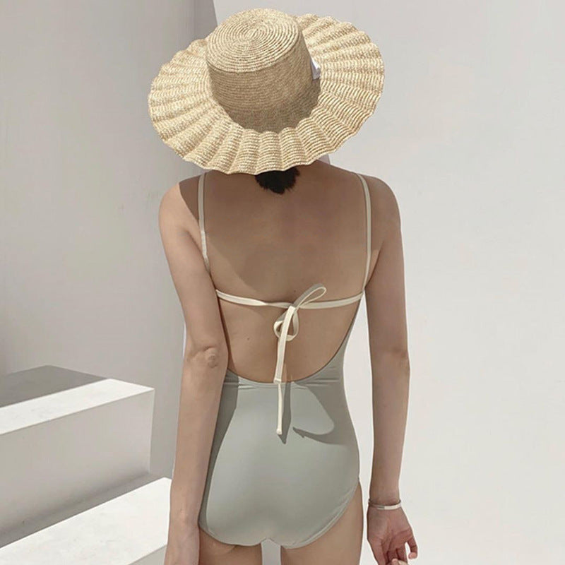 Damen Eleganter Hoch geschnittener Schwimmanzug Echo Archiv