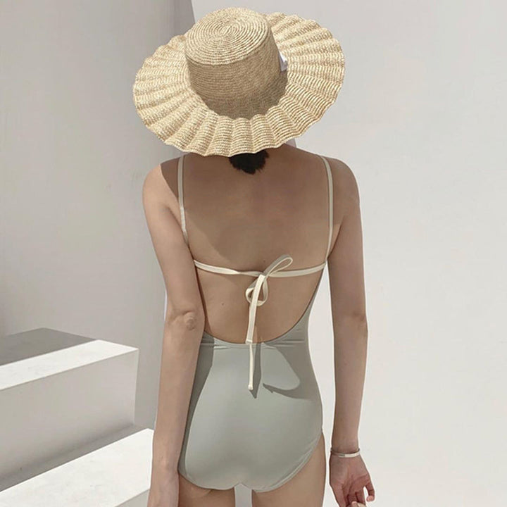 Damen Eleganter Hoch geschnittener Schwimmanzug Echo Archiv