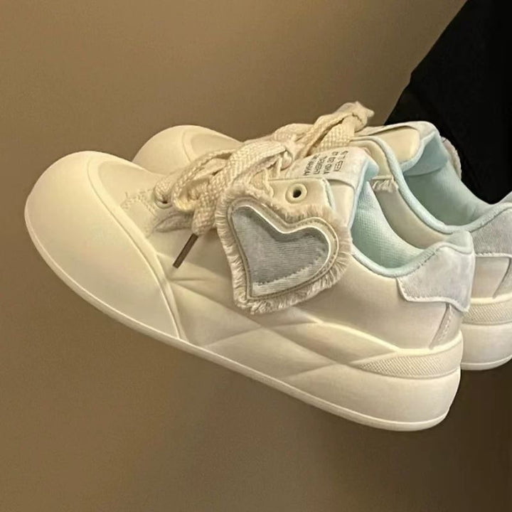 Damen Sneakers mit verspieltem Herz-Design und komfortablem Fußbett Echo Archiv