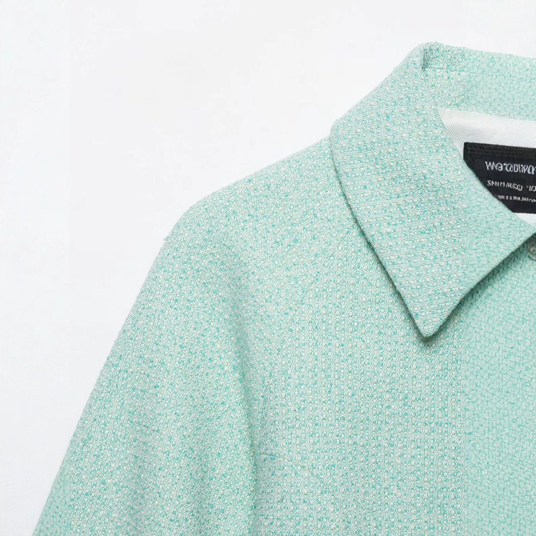 Damen Kurzblouson aus Bouclé mit verdecktem Reißverschluss und Umschlagmanschetten Echo Archiv