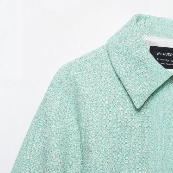 Damen Kurzblouson aus Bouclé mit verdecktem Reißverschluss und Umschlagmanschetten Echo Archiv