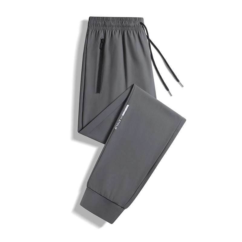 Herren Sportliche Jogginghose mit elastischem Bund und praktischen Reißverschlusstaschen Echo Archiv