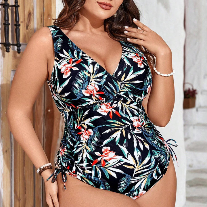 Damen Einteiler Badeanzug mit floralem Wickeldesign und figurformenden Raffungen Echo Archiv