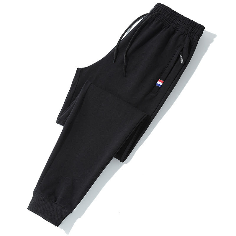 Herren Tapered-Jogginghose mit Tunnelzug, Reißverschlusstasche & Rippbündchen Echo Archiv