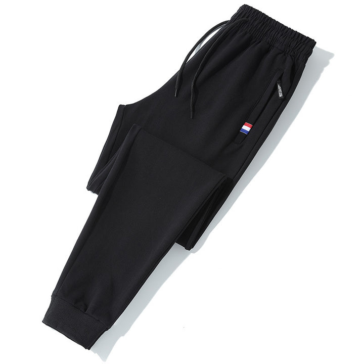 Herren Tapered-Jogginghose mit Tunnelzug, Reißverschlusstasche & Rippbündchen Echo Archiv