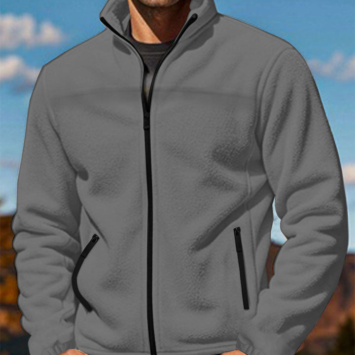 Herren Fleecejacke mit hochschließendem Kragen und Reißverschlusstaschen Echoarchiv