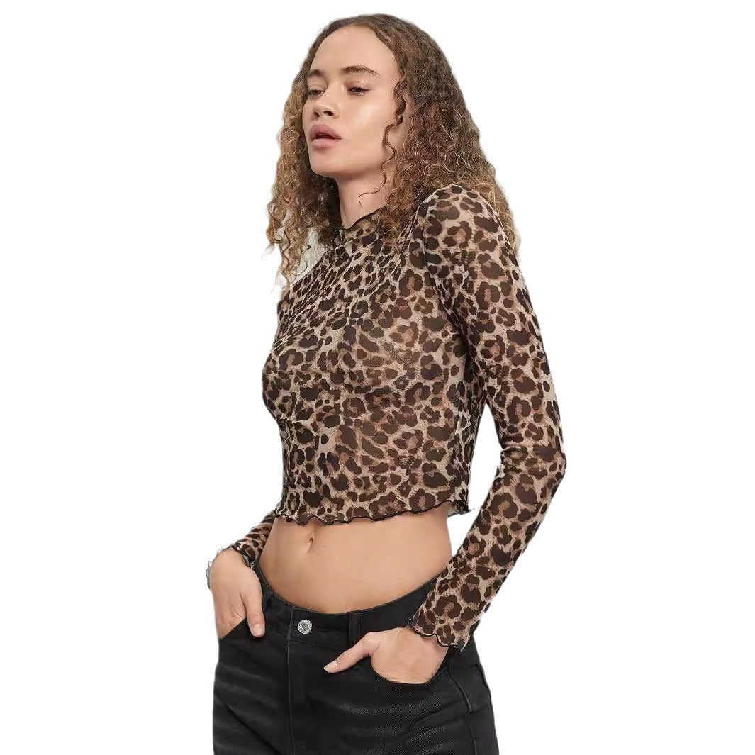 Damen nan figurbetontes bauchfreies Langarmshirt im Animalprint aus feinem Stretchnetz mit Stehkragen und Wellensaum Echo Archiv
