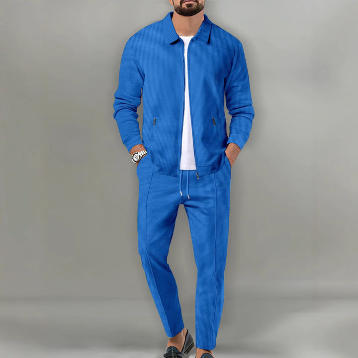 Herren sportliches Set mit strukturierter Jacke und elastischen Jogginghosen Echoarchiv