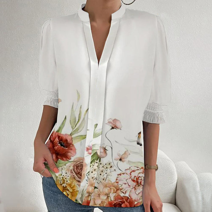 Damen Blumenprint Tunika-Bluse mit Stehkragen, geschlitzter V‑Blende und gerafften 3/4-Ärmeln – Élovi
