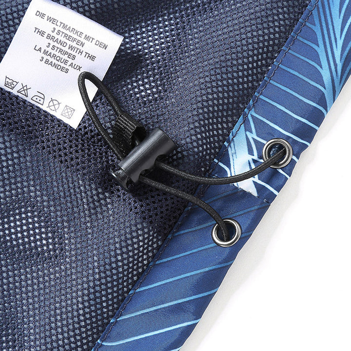 Herren Leichte Kapuzen-Windbreakerjacke mit grafischem Allover-Print und Packfunktion Echo Archiv