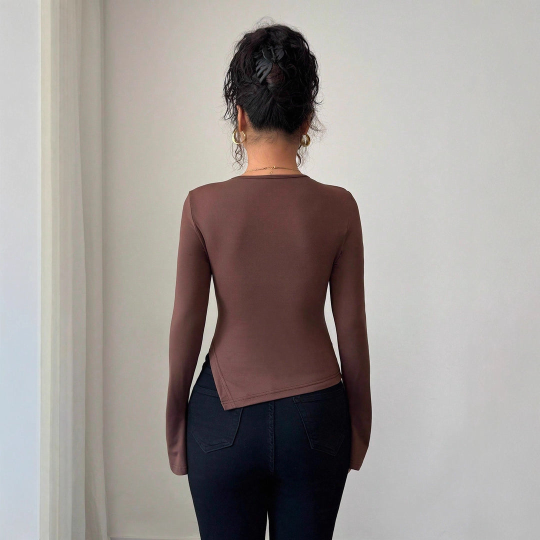 Damen nan figurbetontes Langarmshirt mit Schlüsselloch und Ringapplikation Echo Archiv