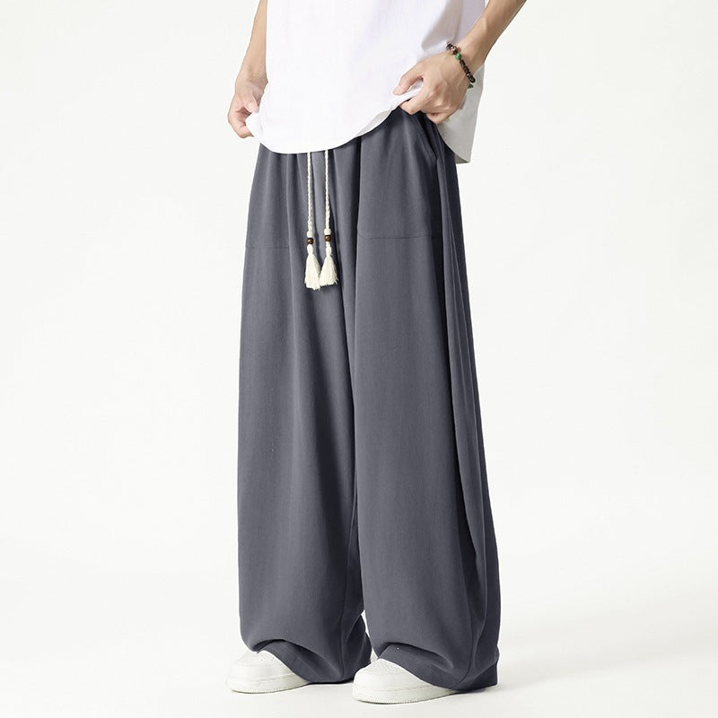 Herren Weit geschnittene Lounge-Hose mit Quasten-Kordel, elastischem Bund und aufgesetzten Taschen Echo Archiv