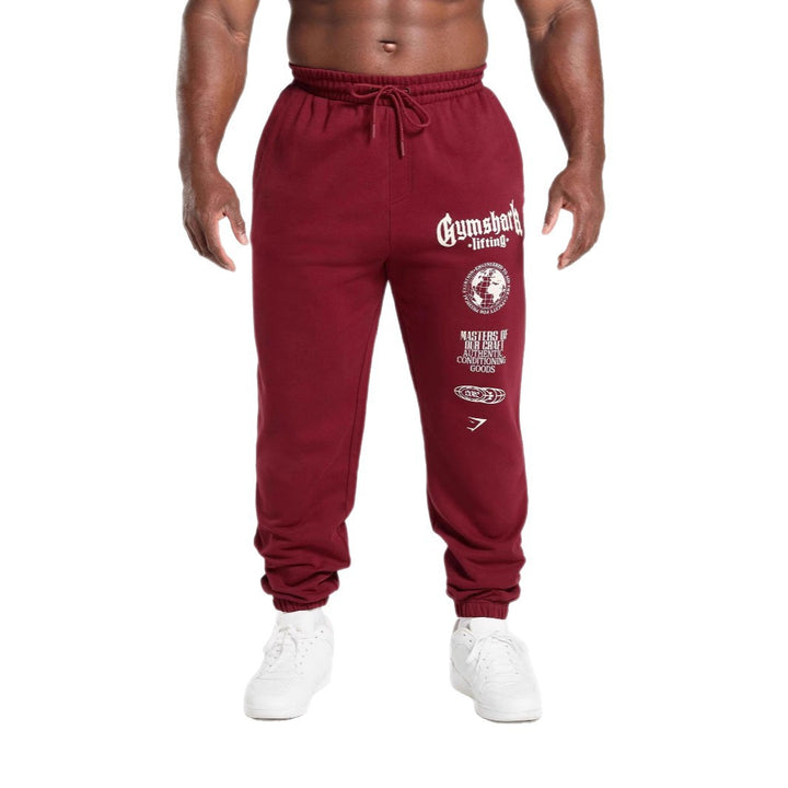 Herren nan konisch geschnittene Baumwollfleece-Sweathose mit elastischem Kordelbund gerippten Beinabschlüssen und großflächigem Logodruck Echo Archiv
