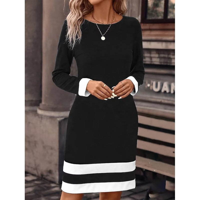 Damen Elegantes Kleid mit kontrastierenden Ärmelabschlüssen und Saum Echoarchiv