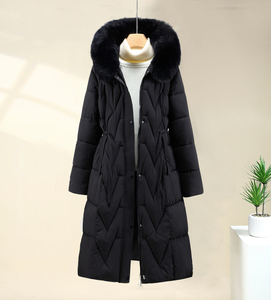 Damen langer gesteppter Parka mit voluminöser Kunstfellkapuze und taillierendem Kordelzug – Montévia