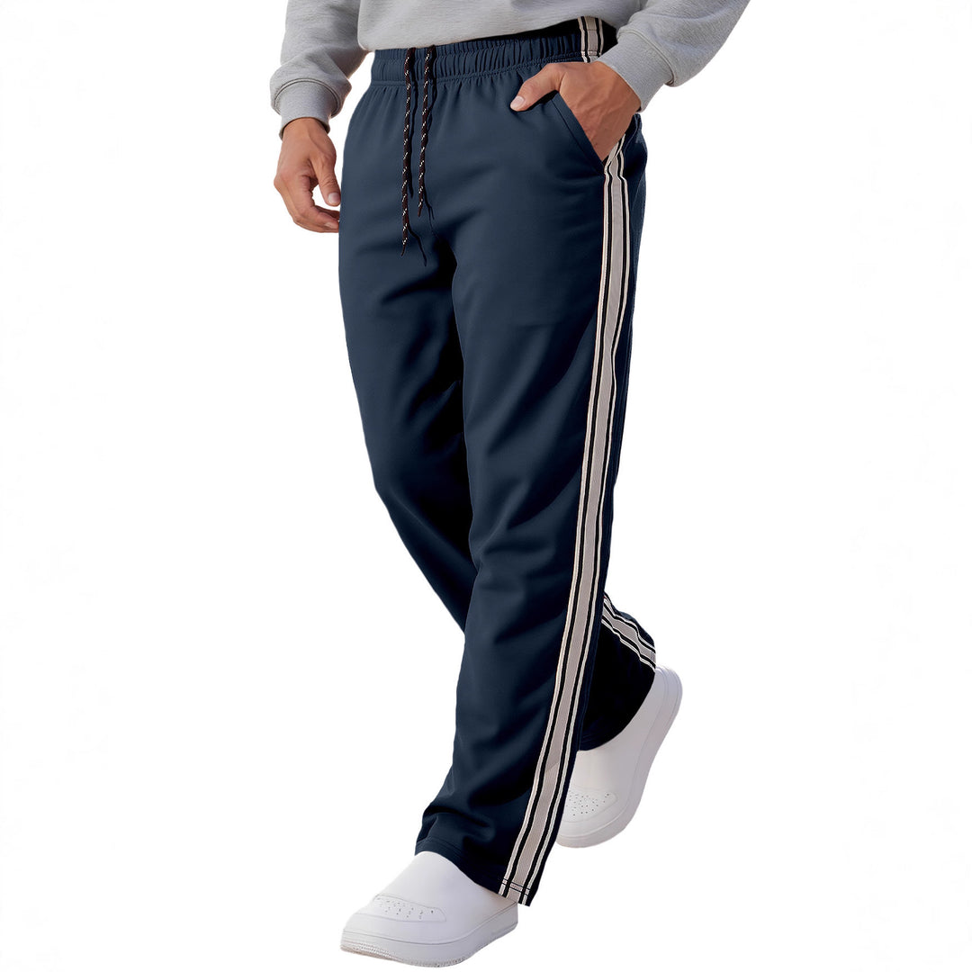 Herren nan Retro-Trackhose mit schmal zulaufendem Bein elastischem Bund Tunnelzug und seitlichen Streifen Echo Archiv