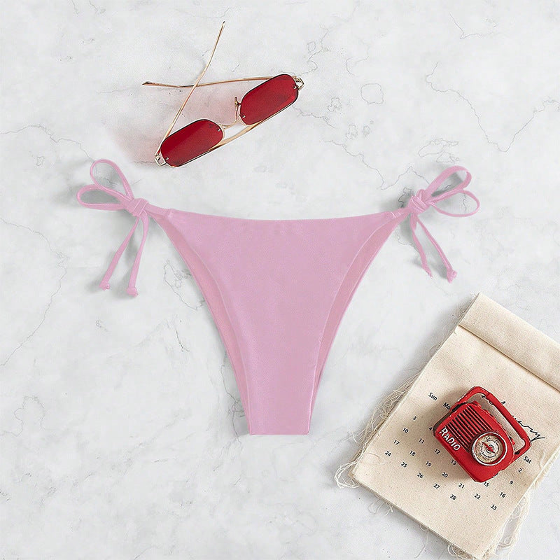Damen Bikinislip mit verstellbaren Seitenbändern und hohem Beinausschnitt Echo Archiv