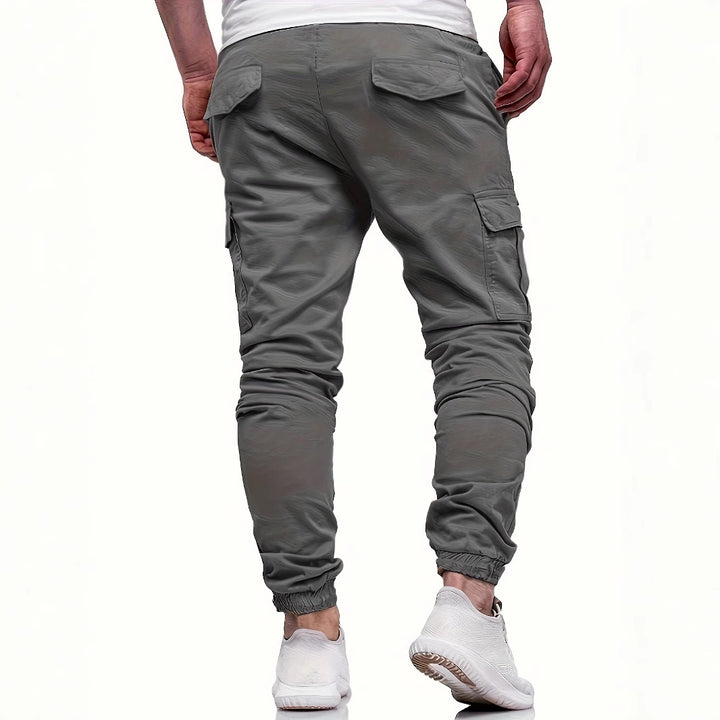 Herren Slim‑Tapered Utility‑Cargohose im Joggerstil mit Klapp- und Reißverschlusstaschen Echo Archiv