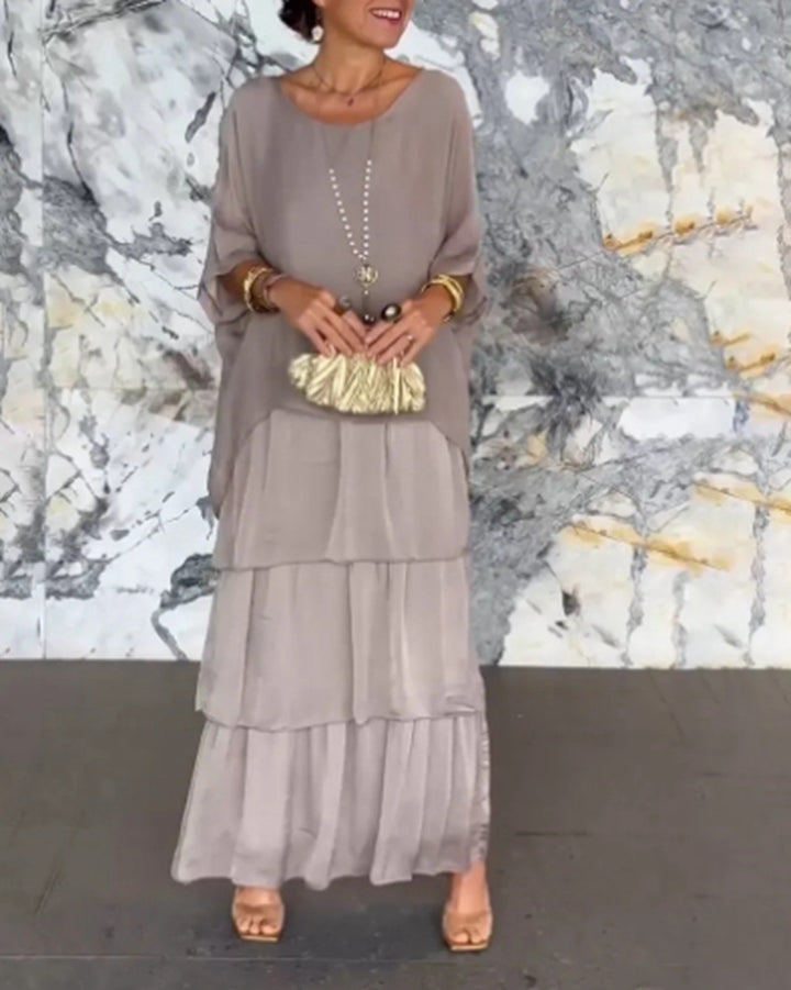 Damen nan bodenlanges Stufenkleid mit weiten Fledermausärmeln und lockerer Silhouette Echo Archiv