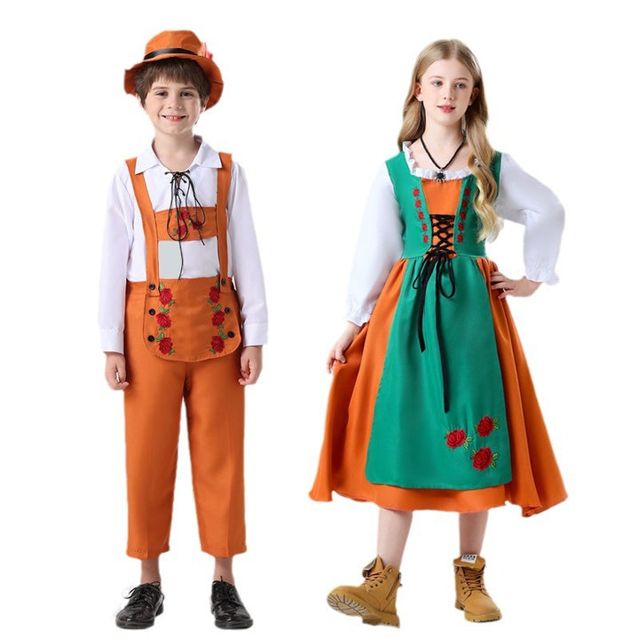 Damen nan folkloristisches Kinderdirndl mit geschnürtem Mieder und bestickter Schürze Echo Archiv
