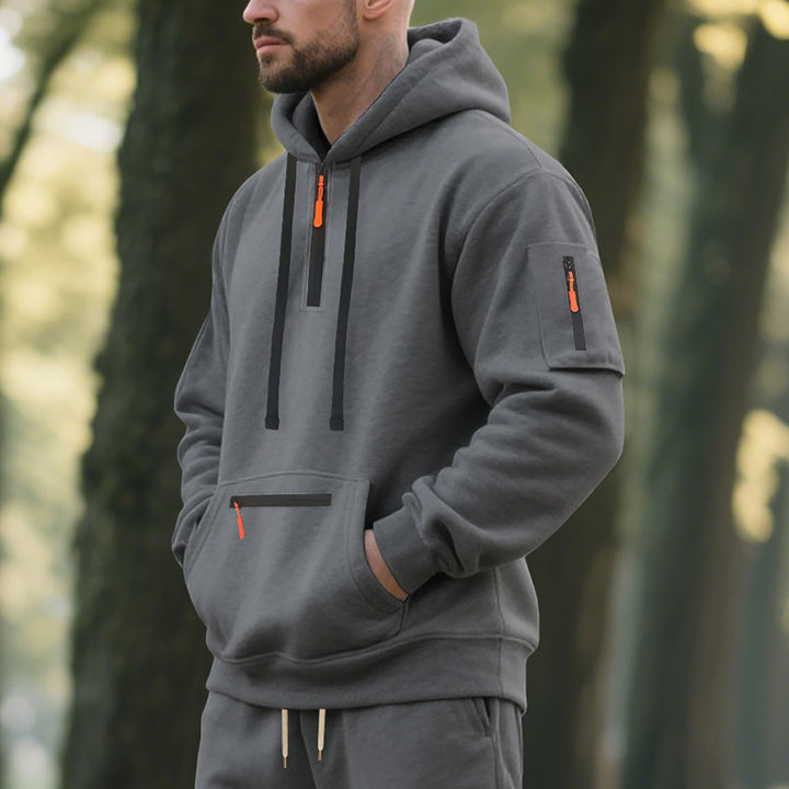 Herren Sportlicher Hoodie mit funktionalen Reißverschlusstaschen Echoarchiv