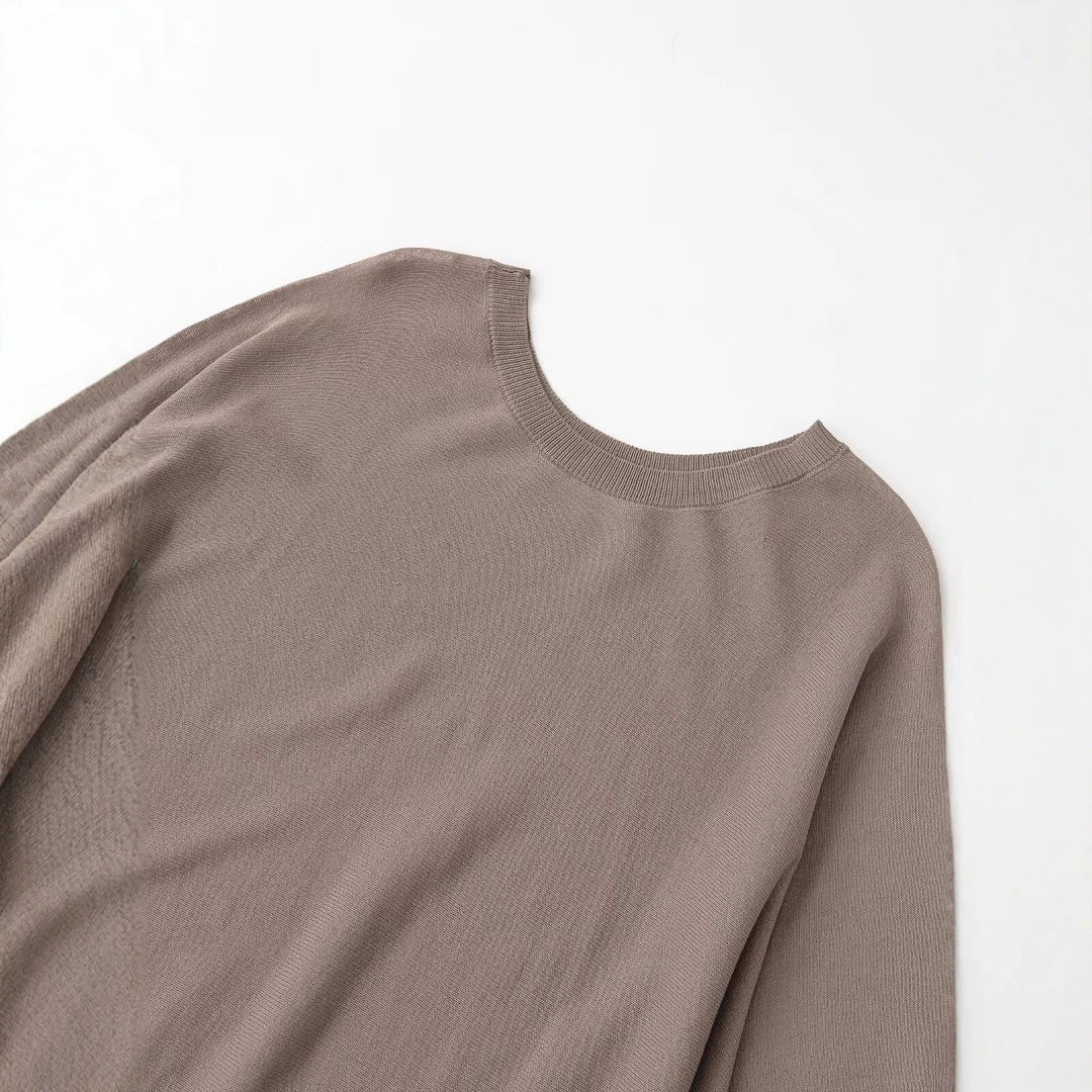 Damen Strickkleid mit überschnittenem Fledermaus-Poncho und Ballonärmeln Echo Archiv