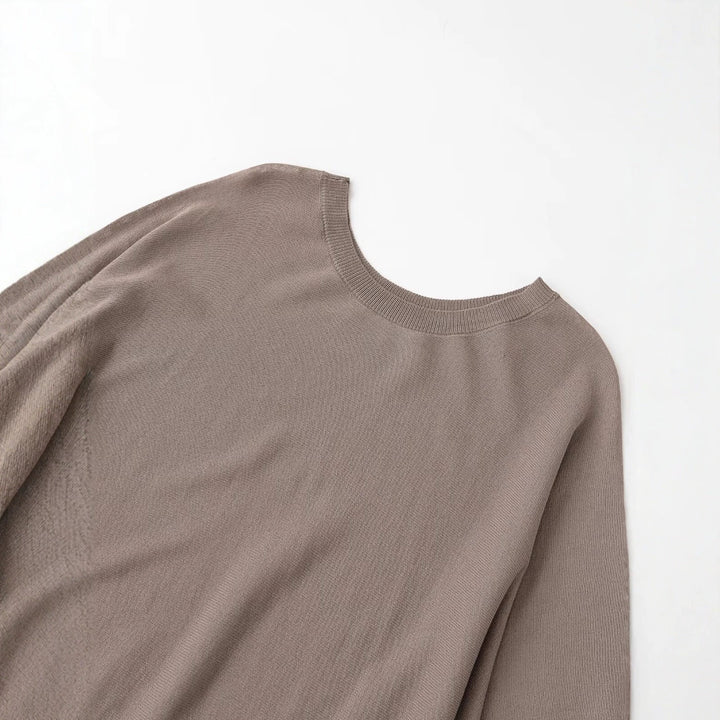 Damen Strickkleid mit überschnittenem Fledermaus-Poncho und Ballonärmeln Echo Archiv