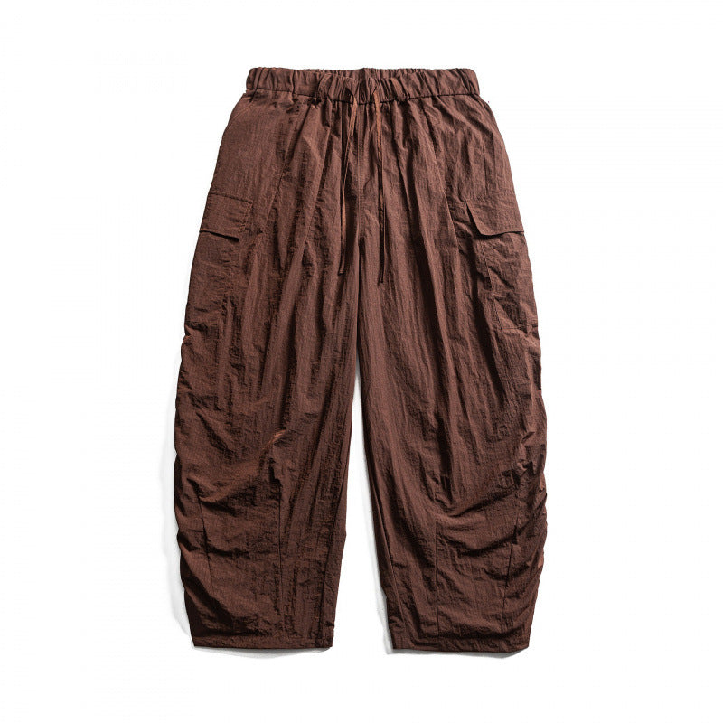 Unisex Weite Cropped Cargo-Hose mit elastischem Bund, Tunnelzug und aufgesetzten Taschen Echo Archiv