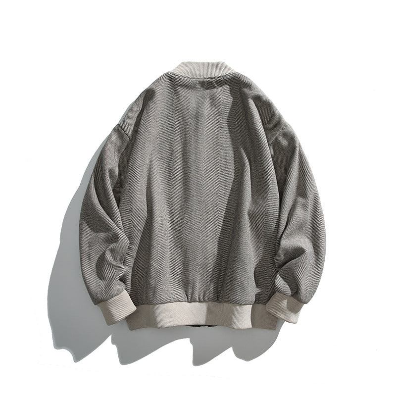 Unisex Boxy-Bomberjacke im Fischgrät-Look mit Rippbündchen, Pattentaschen und verdeckter Druckknopfblende Echo Archiv