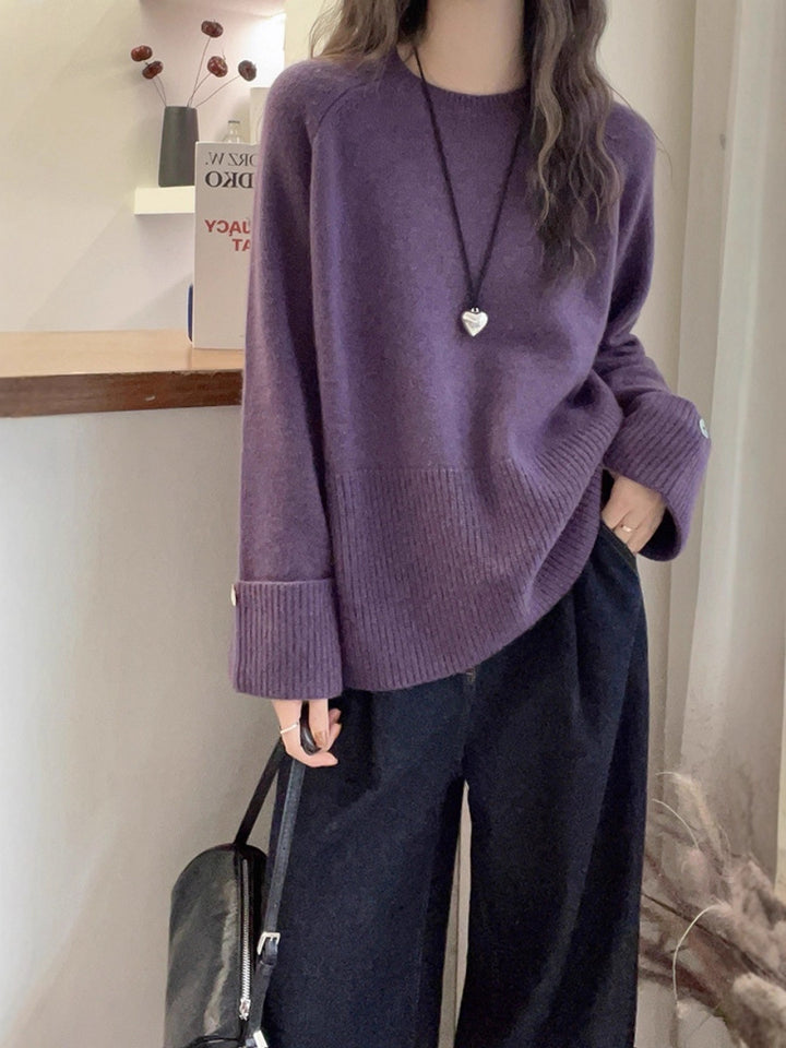 Damen Oversize‑Feinstrickpullover mit breitem Rippbund, extraweiten Ärmelabschlüssen und Zierknopf Echoarchiv