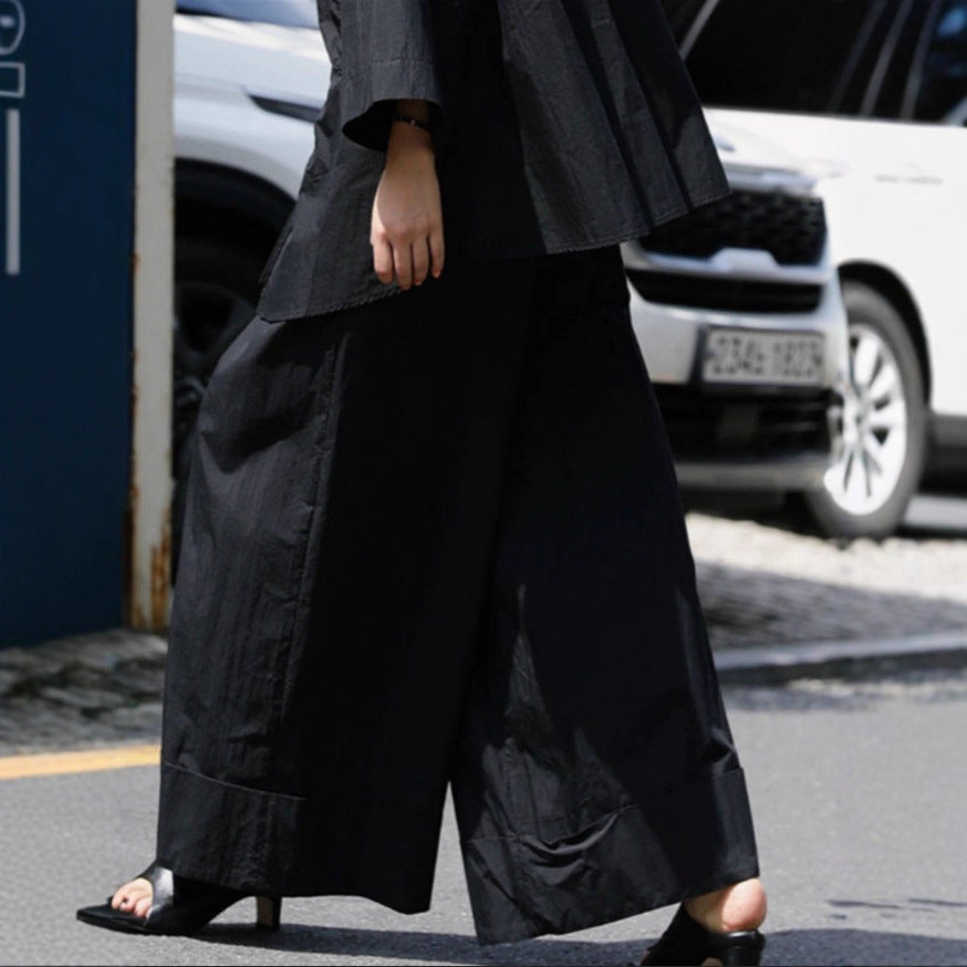 Damen Weite Palazzo-Hose mit hohem Bund und breitem Saum Echoarchiv