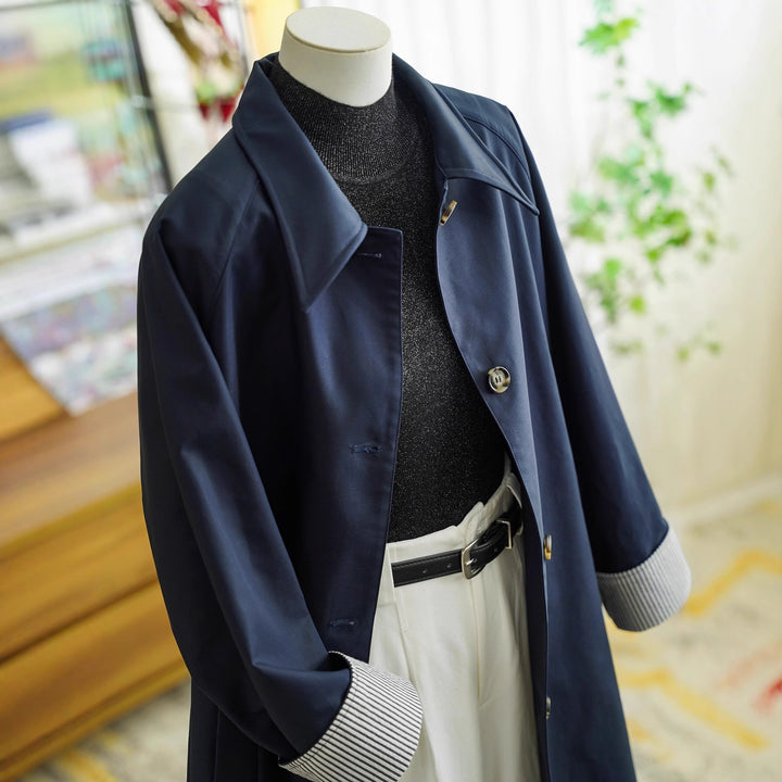 Damen Eleganter Trenchcoat mit Kontrastdetails Echoarchiv