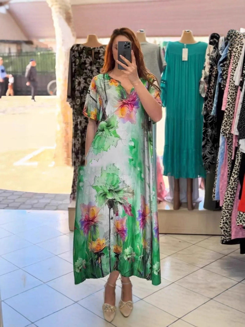 Damen nan fließendes Maxi-Kaftankleid mit V-Ausschnitt und großflächigem Aquarell-Blumenprint Echo Archiv
