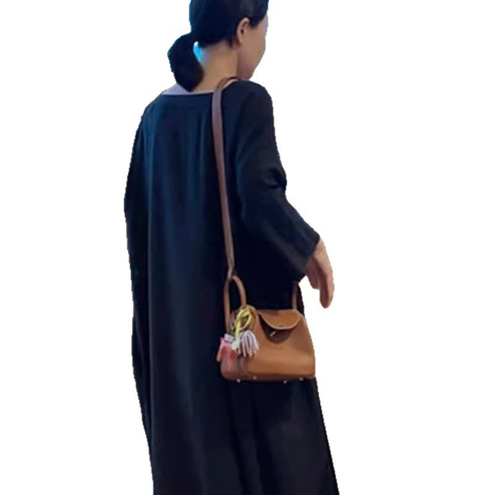Damen Langes Smock‑Maxikleid mit tiefer Taillennaht und weitem Glockenrock – Valéora