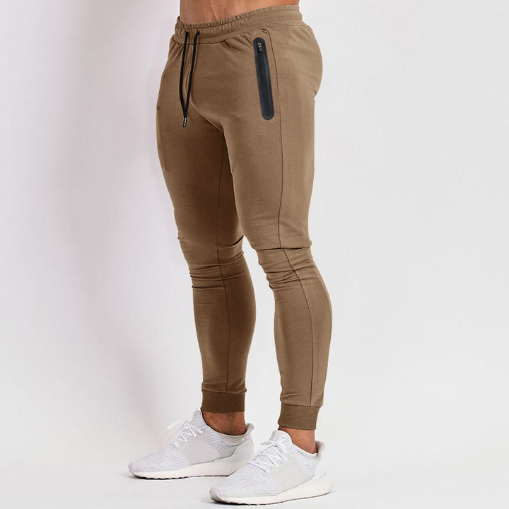 Herren schmal geschnittene Jogginghose mit Reißverschlusstaschen und Kordelzug Echoarchiv