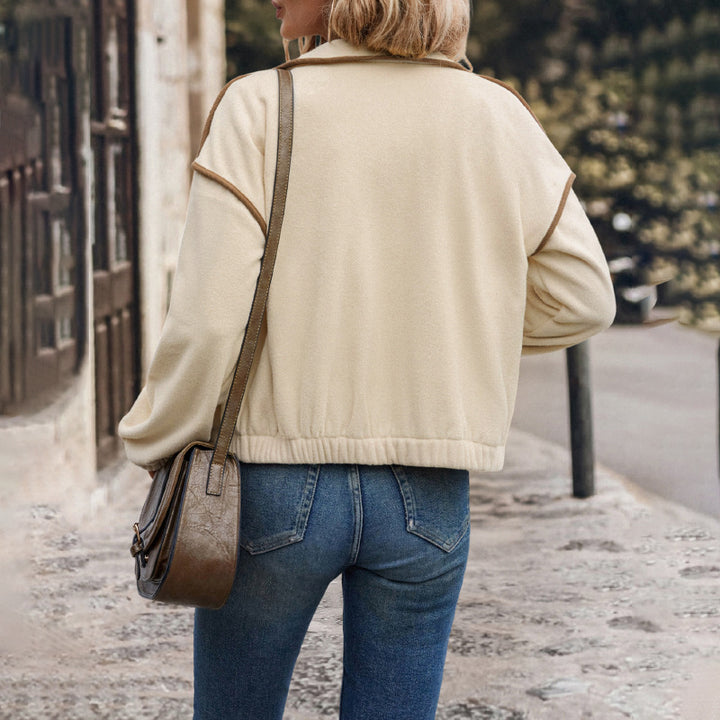 Damen Kurzjacke aus Teddy-Fleece mit Stehkragen, Kontrastpaspel und Reißverschluss Echoarchiv