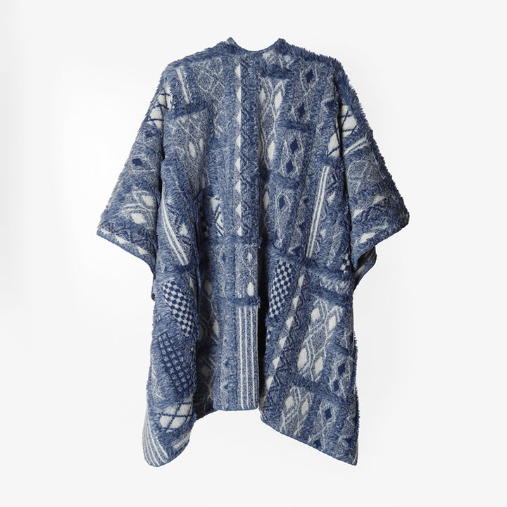 Damen Strukturierter Jacquard Ruana‑Poncho mit Fransenoptik und offener Oversize‑Silhouette – Avérine