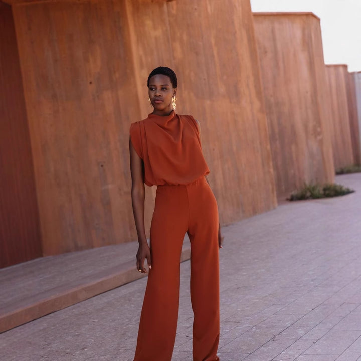Damen Eleganter Jumpsuit mit hochgeschlossenem Kragen und weiten Beinen Echo Archiv