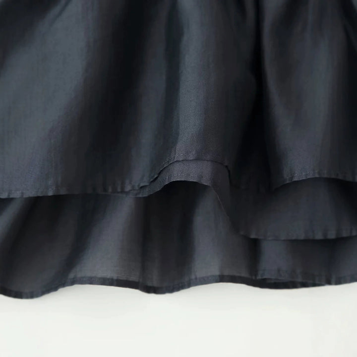 Damen Wickelbluse mit Stehkragen, taillierendem Kordelzug und Schößchensaum – Élovi
