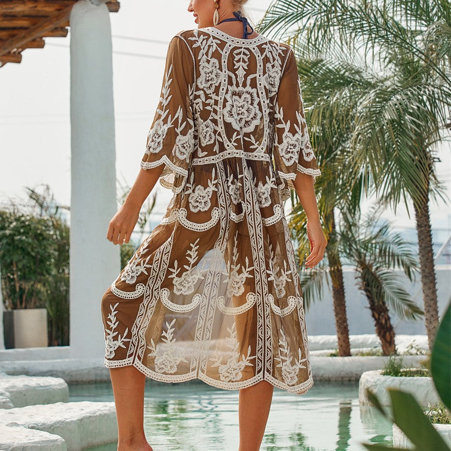 Damen elegante Häkel-Strandrobe mit voluminösen Ärmeln und floralem Design Echo Archiv