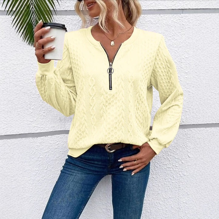 Damen grob strukturiertes Strickpullover mit Kabelmuster, halber Reißverschluss und Ballonärmel Echoarchiv