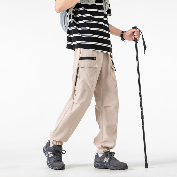 Herren weite Cargo-Jogginghose im Tech‑Utility‑Look mit elastischem Bund und multifunktionalen Klapptaschen Echo Archiv