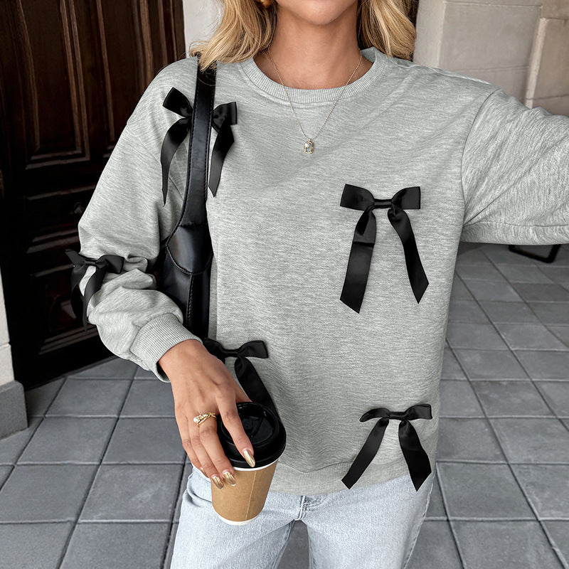 Damen Sweatshirt mit Satin‑Schleifenbesatz und Rundhalsausschnitt Echoarchiv