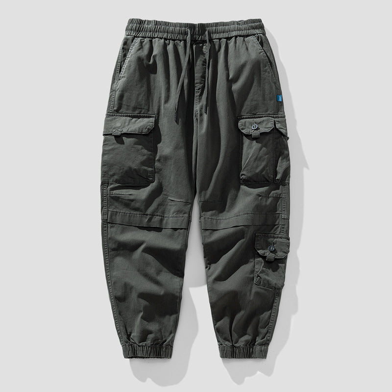 Herren Leichte Canvas-Cargohose im Joggerstil mit elastischem Bund, segmentierten Kniepaneelen und verdeckten Klappentaschen Echo Archiv