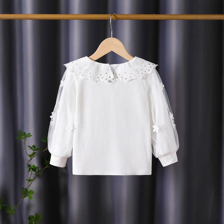 Mädchen Bluse mit voluminösen Tüllärmeln und aufwändigen Blumenstickereien Echo Archiv