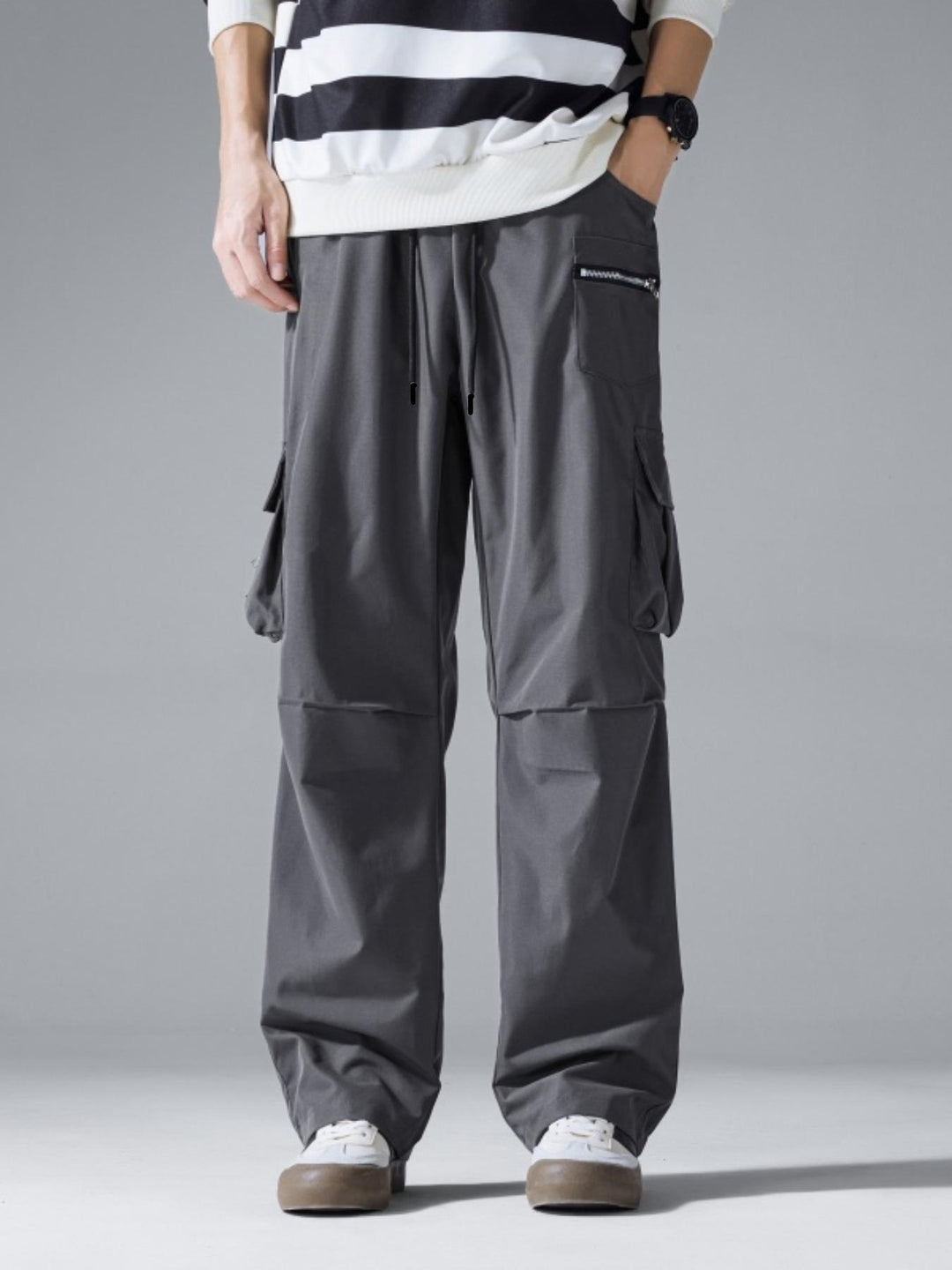 Herren Weite Cargo‑Hose im Baggy‑Cut mit Tunnelzugbund, Zipper‑Tasche & Klappfächern Echo Archiv