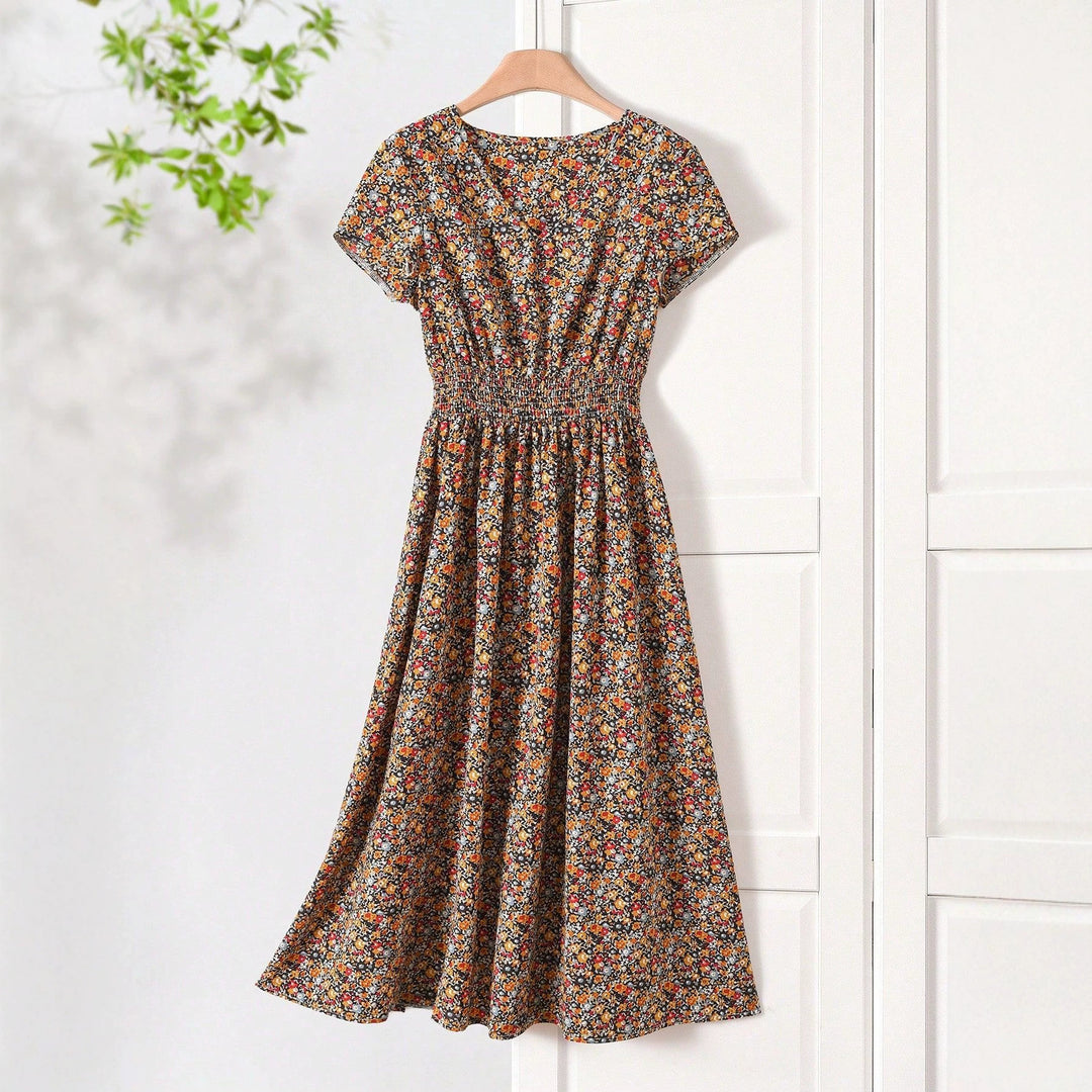 Damen Sommerliches Midikleid mit elastischem Bund und floralen Mustern Echo Archiv