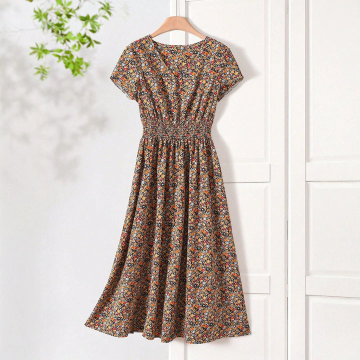 Damen Sommerliches Midikleid mit elastischem Bund und floralen Mustern Echo Archiv