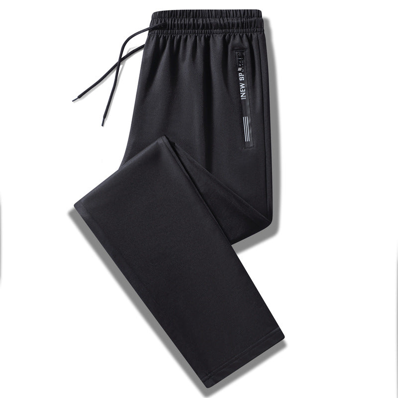 Herren Sportliche Trainingshose mit elastischem Tunnelzugbund, Reißverschlusstasche und glattem Performance‑Material Echo Archiv