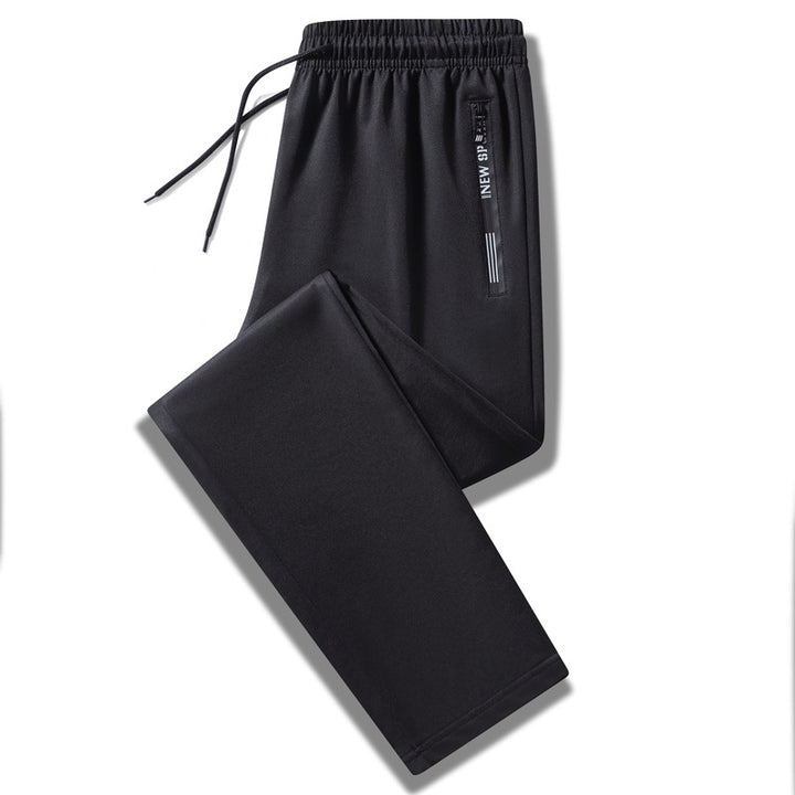 Herren Sportliche Trainingshose mit elastischem Tunnelzugbund, Reißverschlusstasche und glattem Performance‑Material Echo Archiv